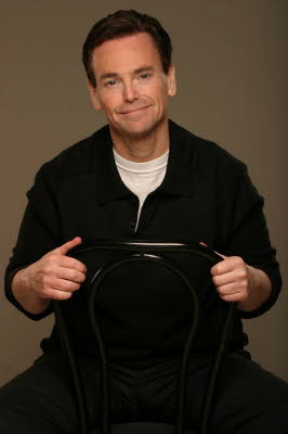 Brad Slaight Headshot Casual Sitting On Chair